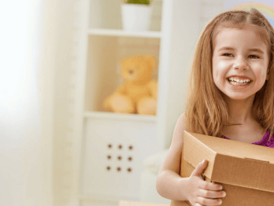 young girl with a box