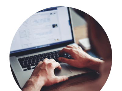 someone on their laptop looking for shipping services