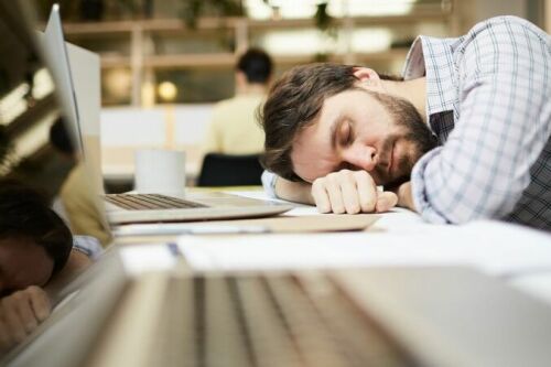 Man struggling at work